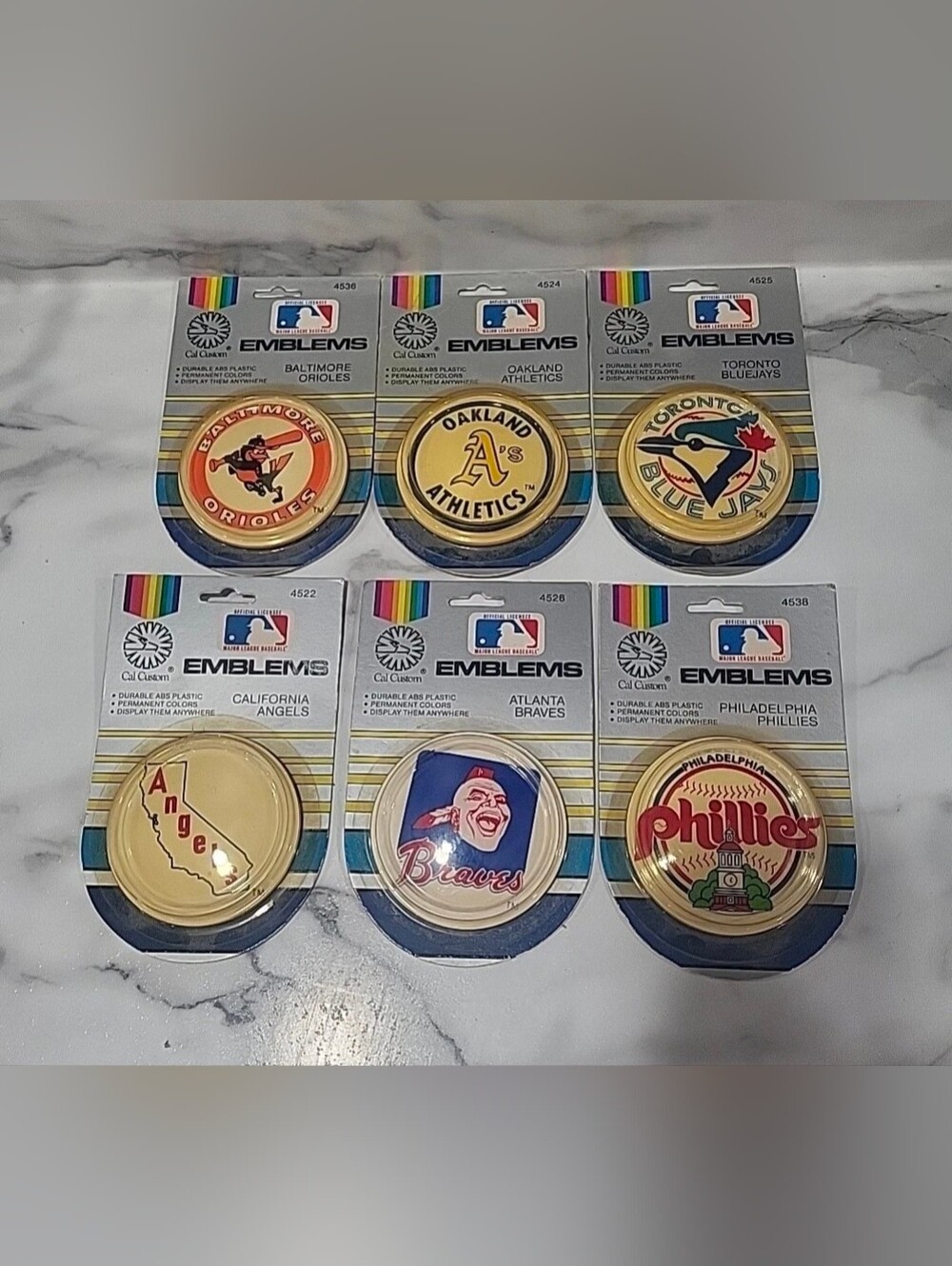 Vintage 1980s Cal Custom MLB Emblems Lot Orioles A’s Phillies Braves NOS
